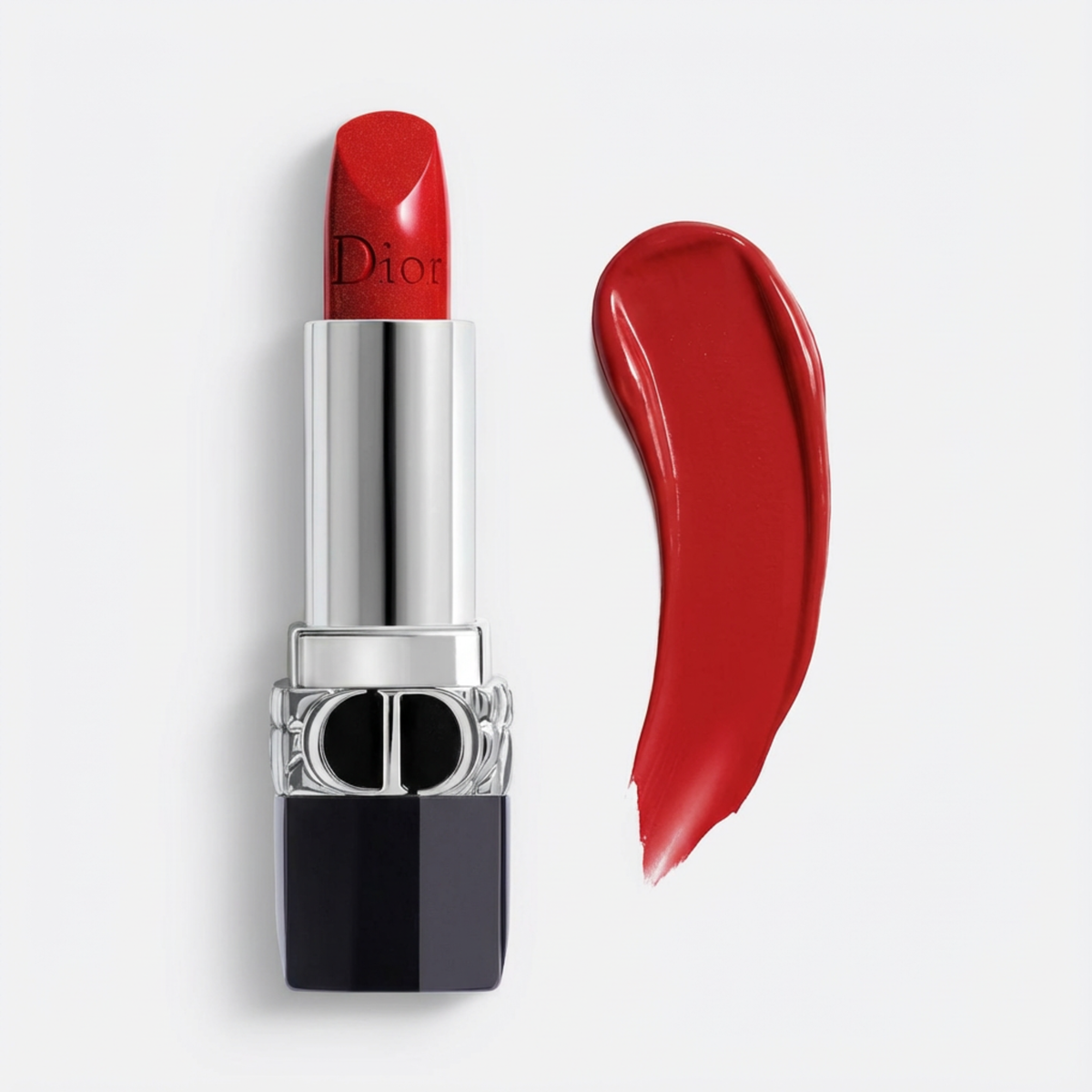 Dior lipstick in a bright red shade, shown with its silver and black tube alongside a matching red product smear on a light gray background.